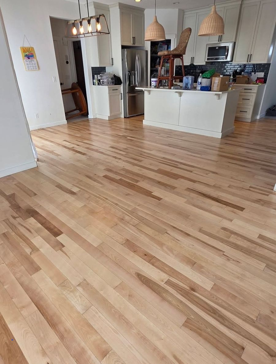 Prefinished maple hardwood floor after refinishing by Wildrose Hardwood, Calgary Airdrie